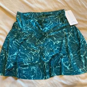 Athleta- ace printed tennis skirt (sz. Small)